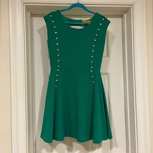 Nicole Miller size Small green dress with gold metal detail. Stretch fabric.